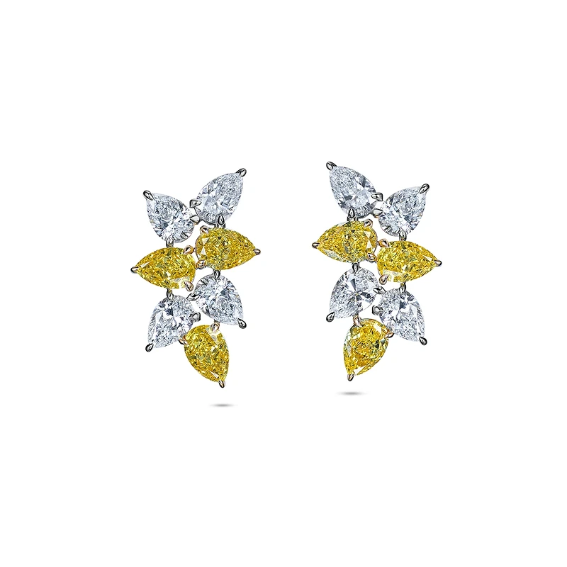 Pair of earrings with yellow and white stones